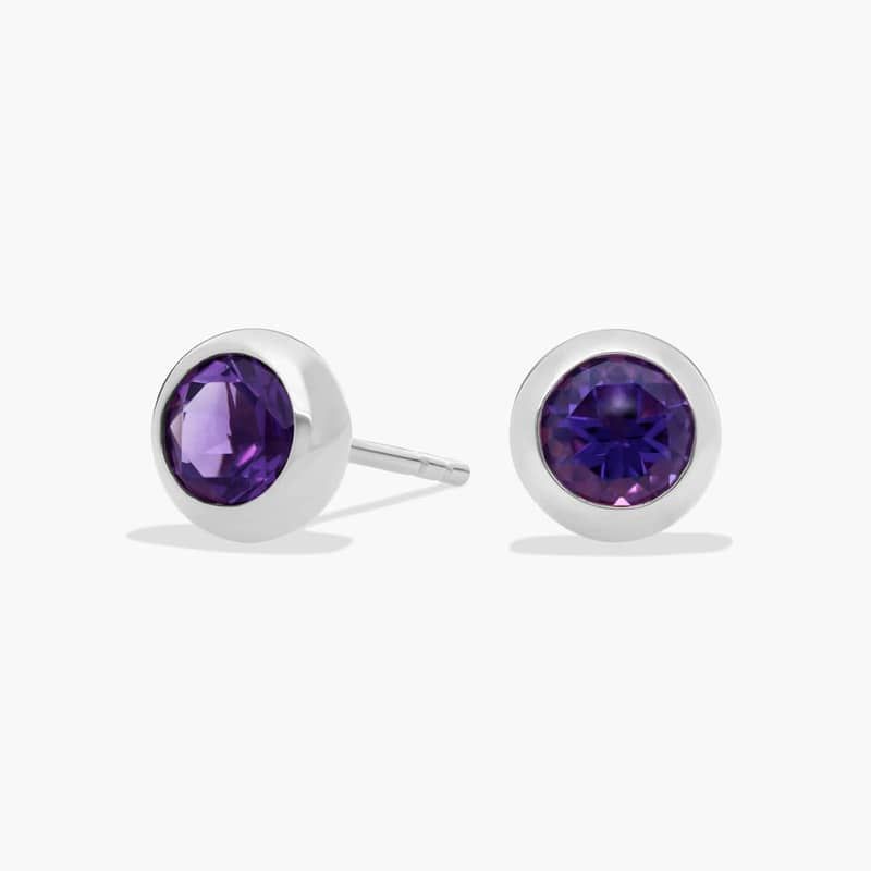 Bezel Set Blue Topaz Earrings in 14k White Gold